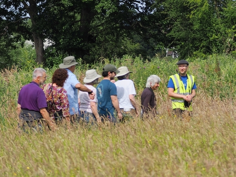 Andy Karran taking visitors to the Bridewell opening on a tour of the reserve